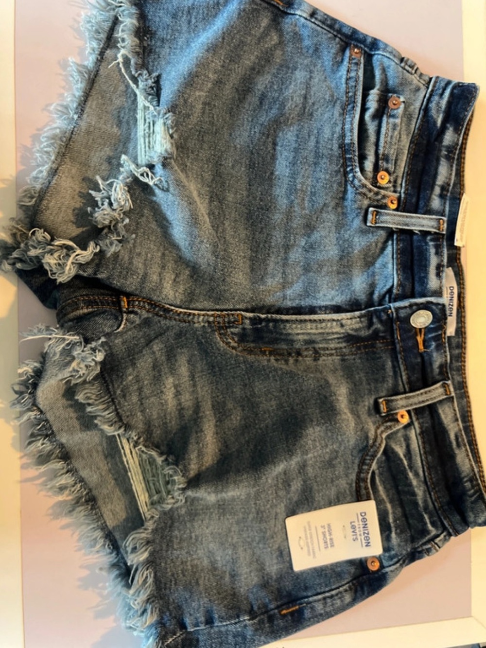 Denizen from Levi's Distressed Light Blue High-Rise Denim Shorts